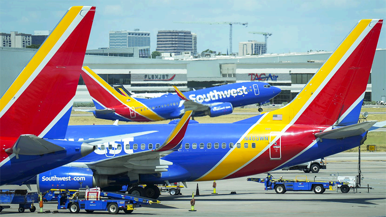 Avión Regresa a Houston por Amenaza de Pasajera